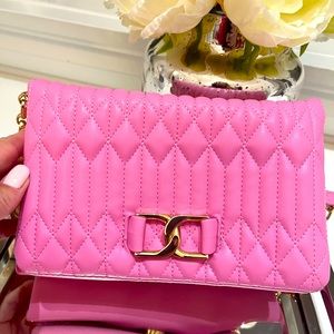 A pink shoulder bag